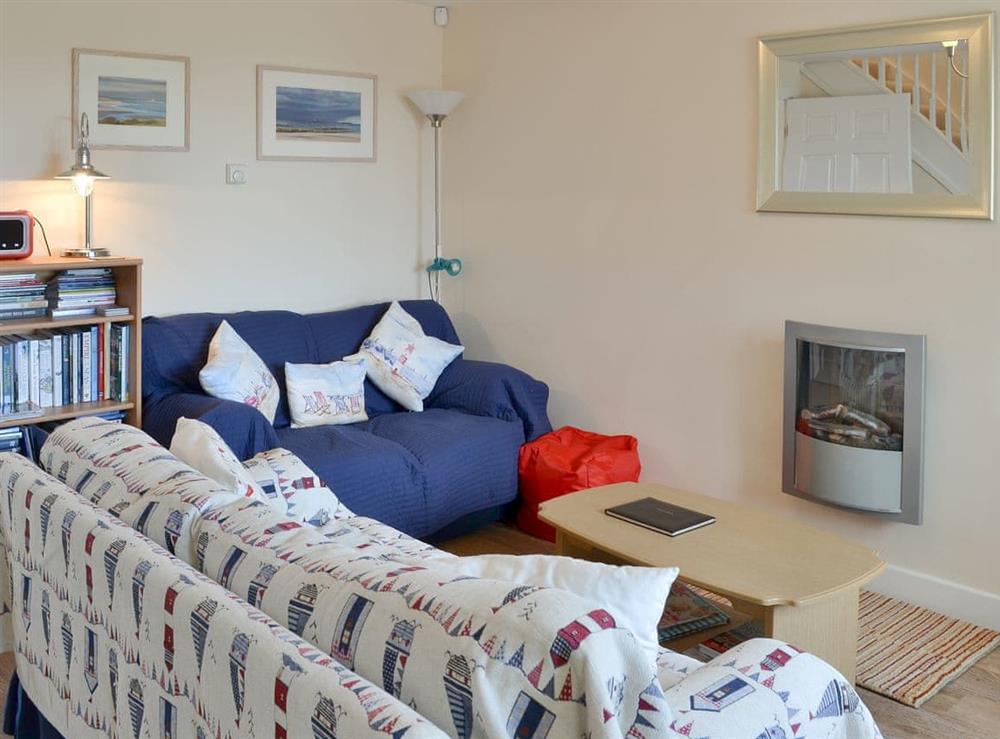 Comfortable living room at Fishers Cottage in Seahouses, Northumberland