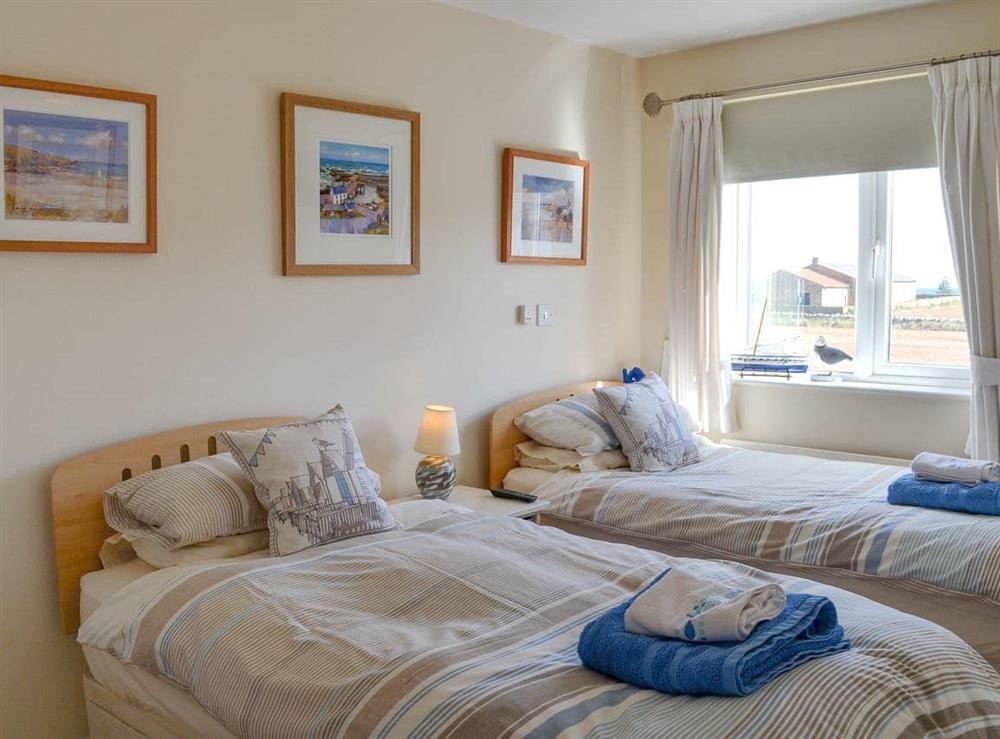 Cosy twin bedroom at Fishers Cottage in Seahouses, Northumberland