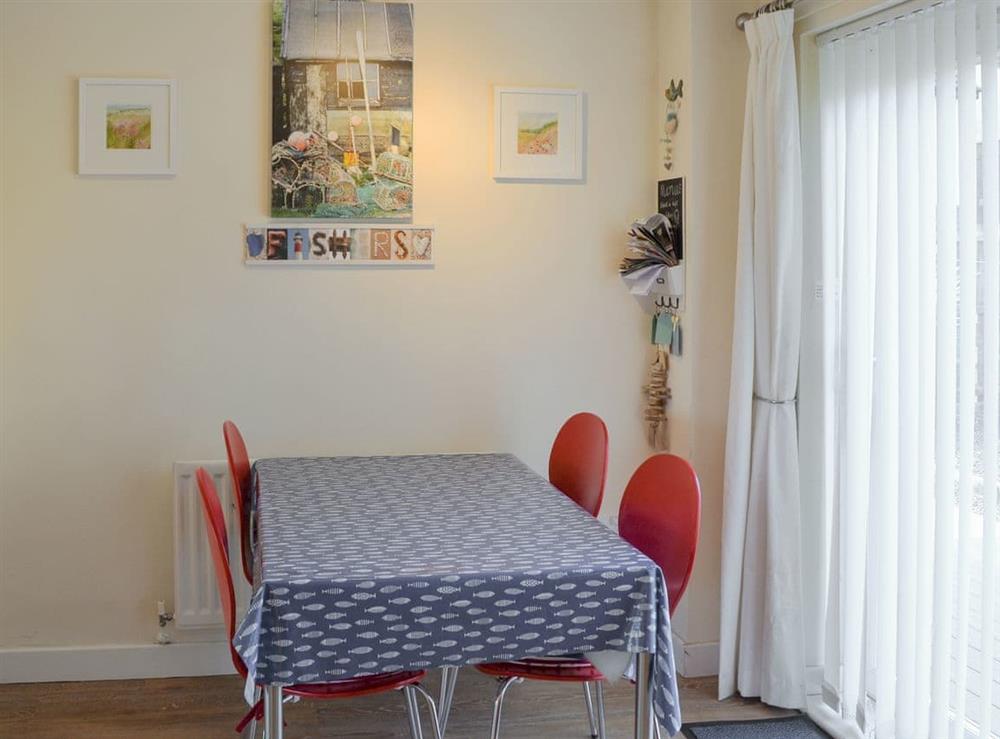 Quaint dining area at Fishers Cottage in Seahouses, Northumberland