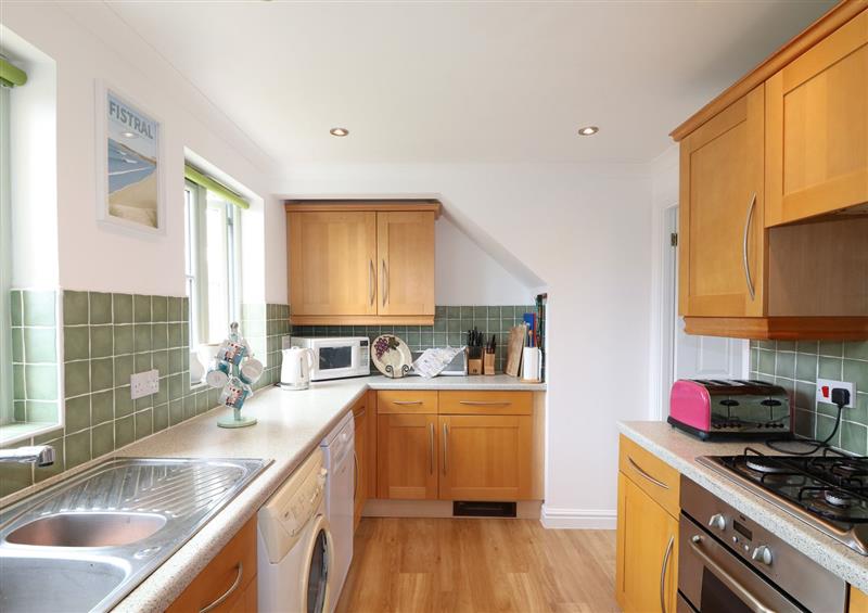 This is the kitchen at Fistral Bay Cottage, Newquay