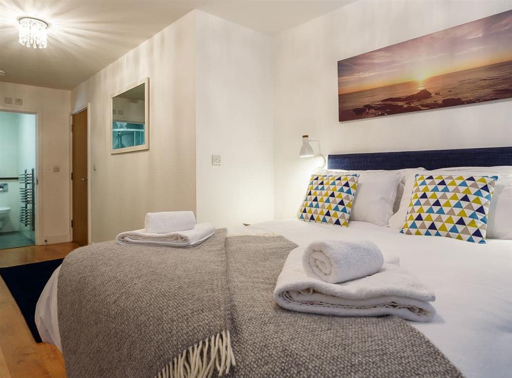 Comfortable double bedroom with en-suite (photo 2) at Fistral Waves in Newquay, Cornwall
