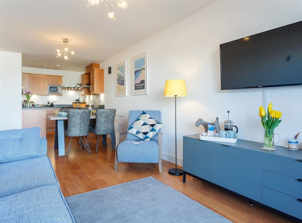 Cosy open plan living space at Fistral Waves in Newquay, Cornwall