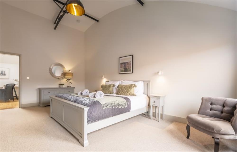 Bedroom four with super-king size bed at Fitters Barn, Warham
