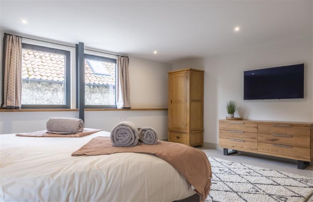 Bedroom three with super-king size bed and Smart television at Fitters Barn, Warham