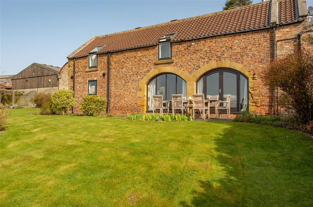 Impressive arched windows to sitting room  at Five Acres, Boltby