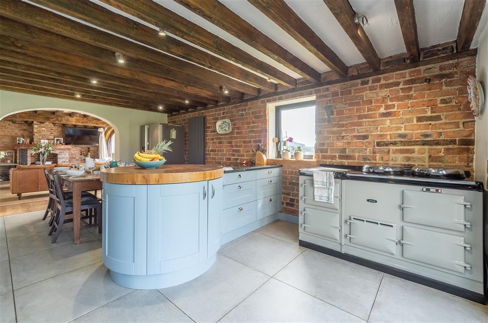 Kitchen with island unit and duck egg blue, four oven Aga at Five Acres, Boltby