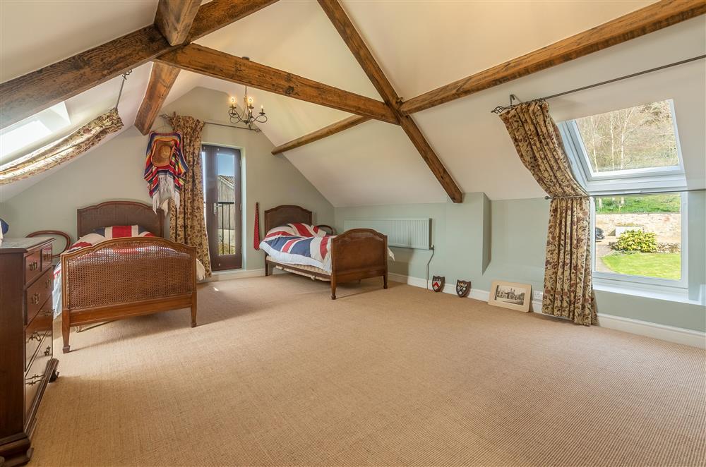 Twin bedroom four with beautiful views of the countryside at Five Acres, Boltby
