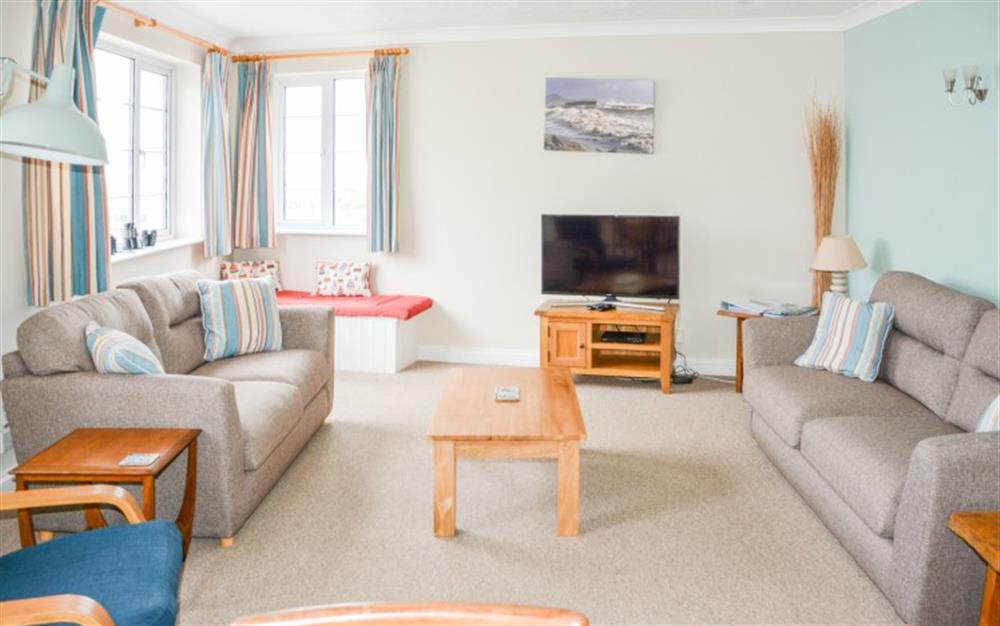 The living room at Flat 1, Harbour House in Lyme Regis