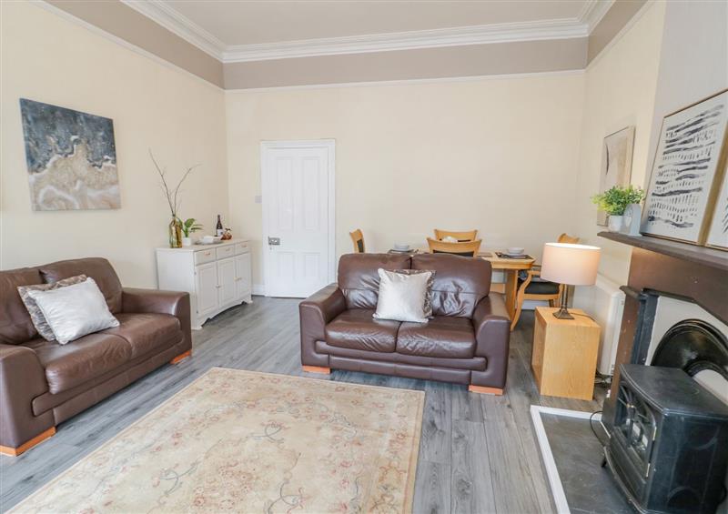 Relax in the living area at Flat 1, Llandudno