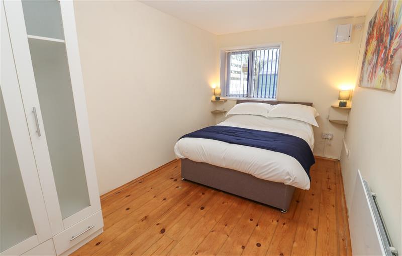 This is a bedroom at Flat 1, Marina Court, Portreath