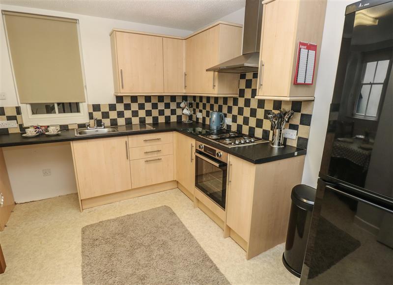 This is the kitchen (photo 2) at Flat 1, Tenby