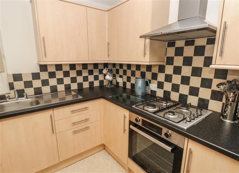 This is the kitchen (photo 3) at Flat 1, Tenby