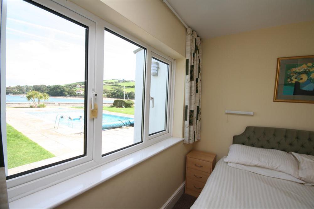 Master bedroom with en suite bathroom at Flat 1 The Salcombe in Fore Street, Salcombe