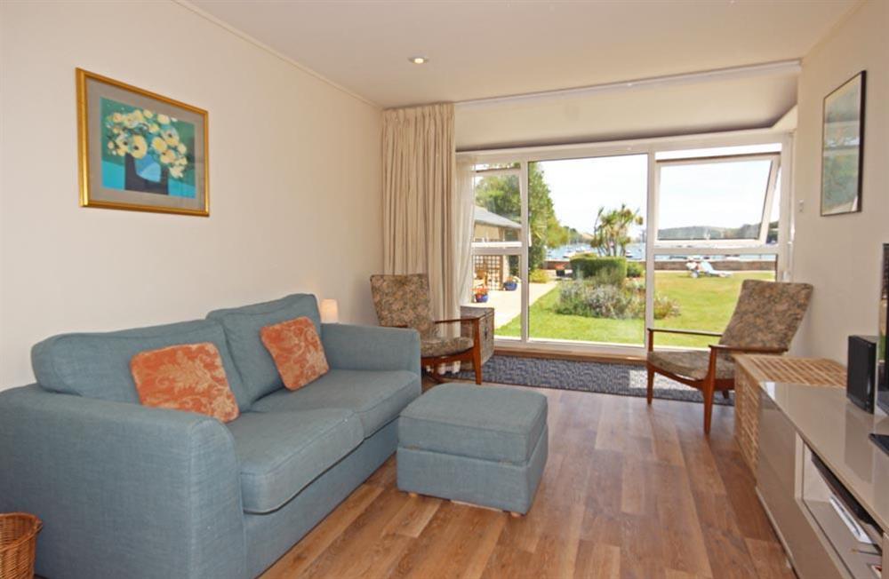 Recently upgraded sitting area with views across pool to the estuary (photo 2) at Flat 1 The Salcombe in Fore Street, Salcombe