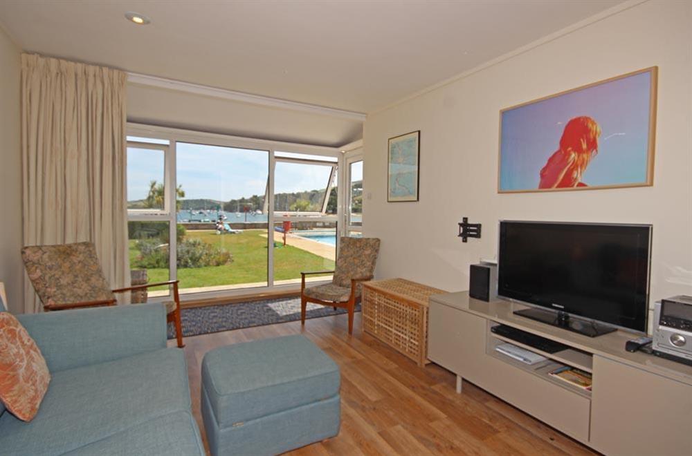 Recently upgraded sitting area with views across pool to the estuary at Flat 1 The Salcombe in Fore Street, Salcombe