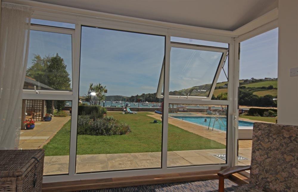 View across swimming pool at Flat 1 The Salcombe in Fore Street, Salcombe
