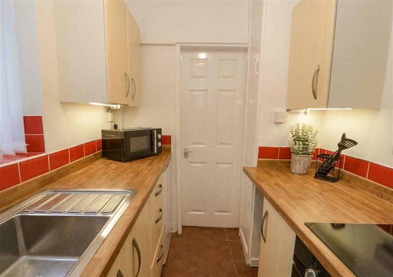 This is the kitchen at Flat 1A Mona House, Deganwy