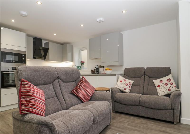 Relax in the living area at Flat 2, 38 Preston Road, Weymouth