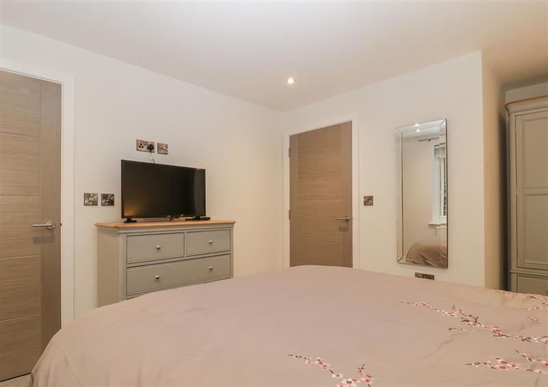 This is a bedroom (photo 2) at Flat 2, 38 Preston Road, Weymouth