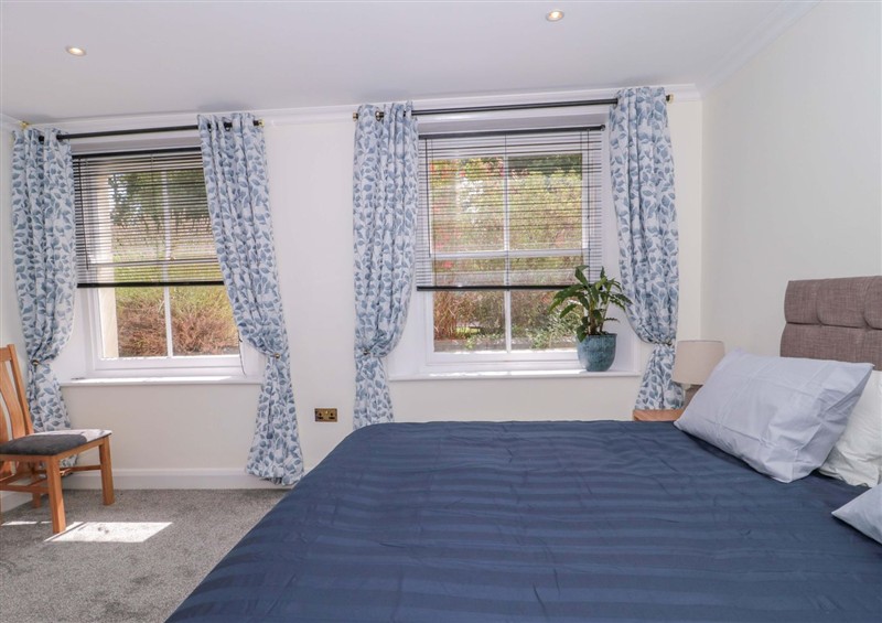 This is a bedroom at Flat 2 Battledown Grange, Cheltenham