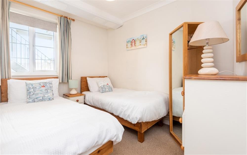 Bedroom 1 twin room at Flat 2, Harbour House in Lyme Regis