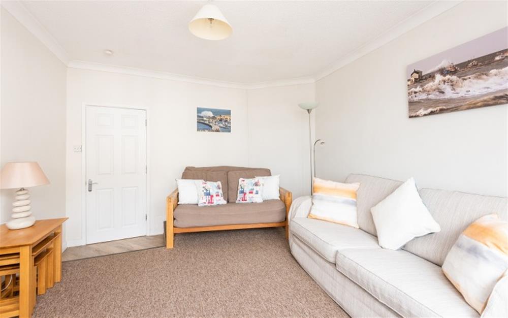 Bright living room at Flat 2, Harbour House in Lyme Regis