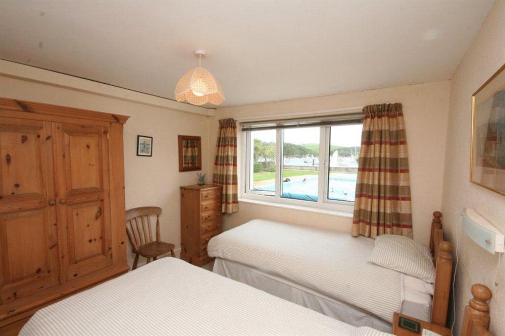 Twin bedroom overlooking the pool area at Flat 3 The Salcombe in , Salcombe
