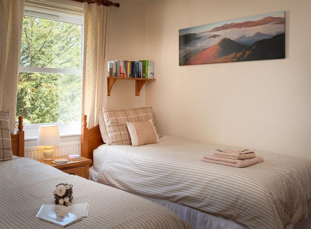 Comfy twin bedroom at Flat 4, Lonsdale House in Keswick, Cumbria