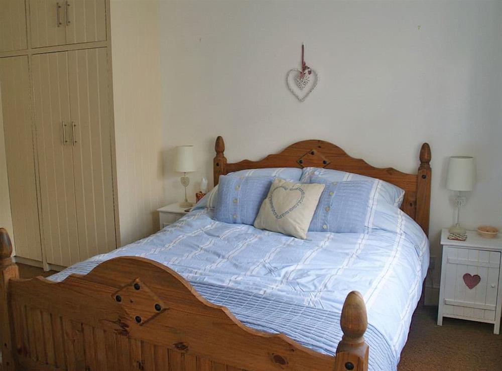 Relaxing double bedroom at Flat 4, Trelawney Court in Rock, Cornwall