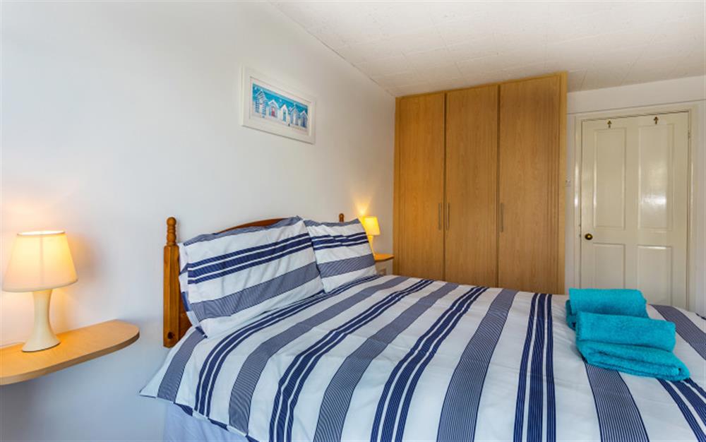 This is a bedroom at Flat 4, West Quay House, in Looe