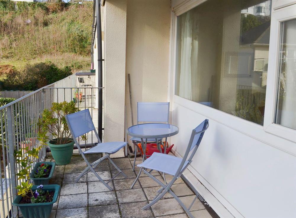Balcony with outdoor furniture at Flat F1 in Dawlish Warren, Devon, England