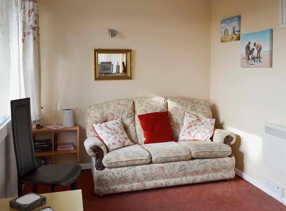 Living area at Flat F1 in Dawlish Warren, Devon, England