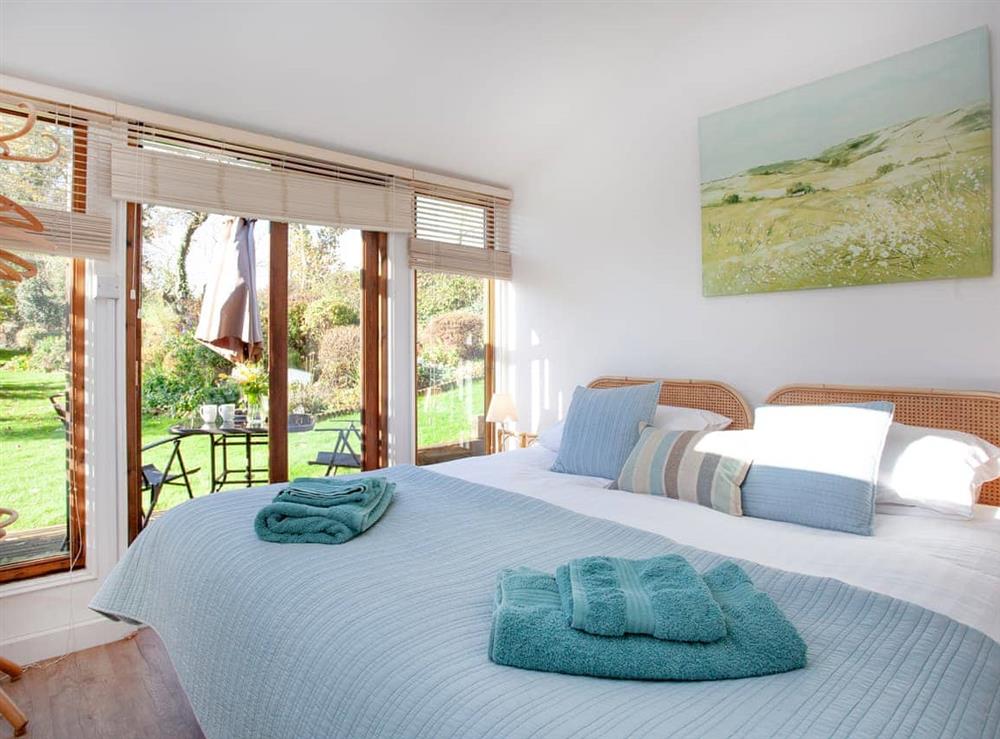 Double bedroom at Flaxpool Well Garden Room in Crowcombe, near Taunton, Somerset