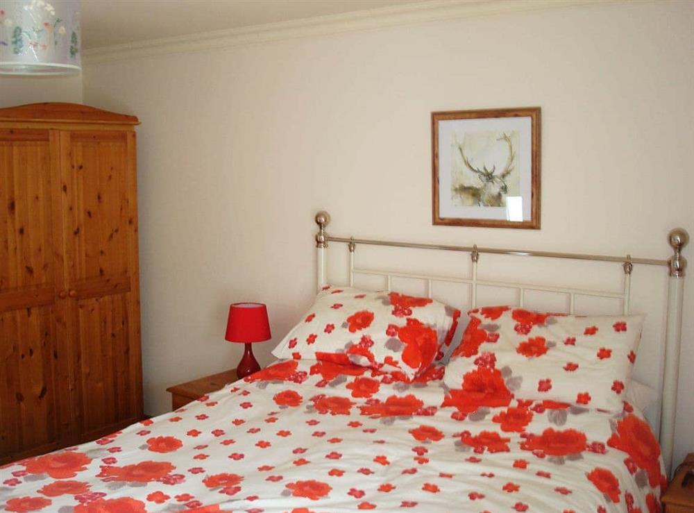 Relaxing double bedroom at Fleet Cottage in Portree, Isle of Skye., Isle Of Skye