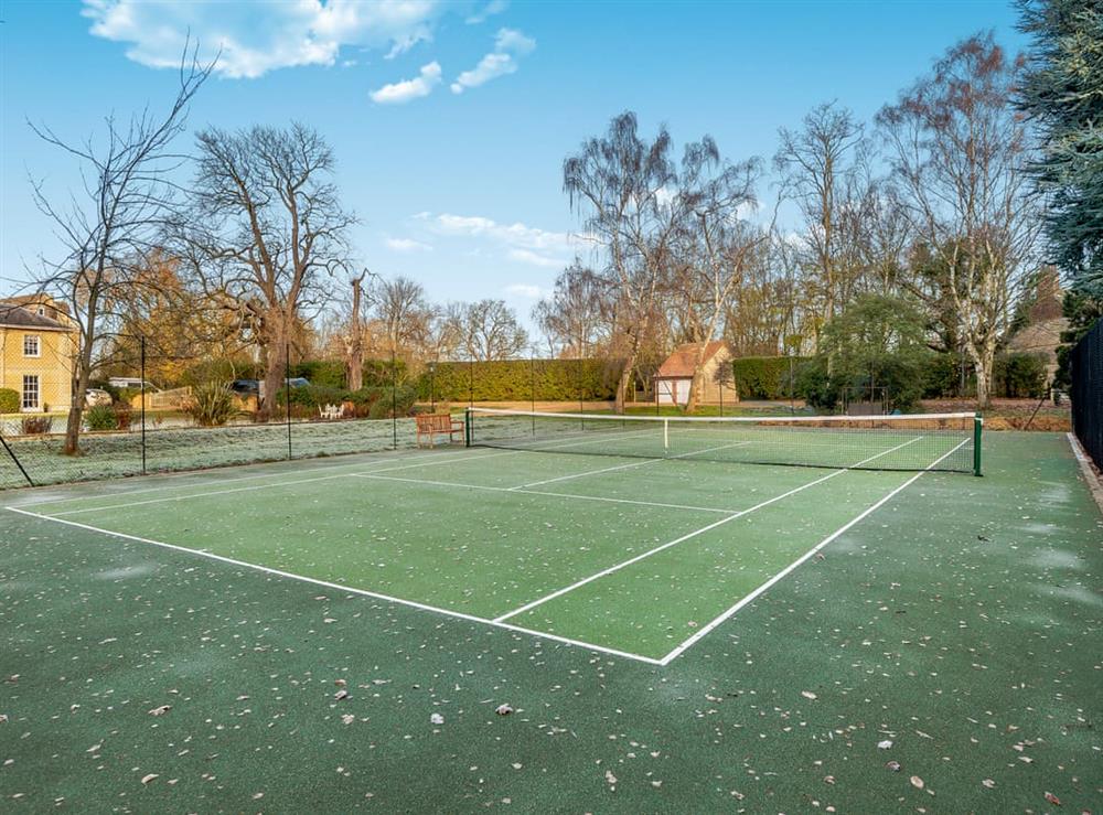 Tennis court at The Holt, 
