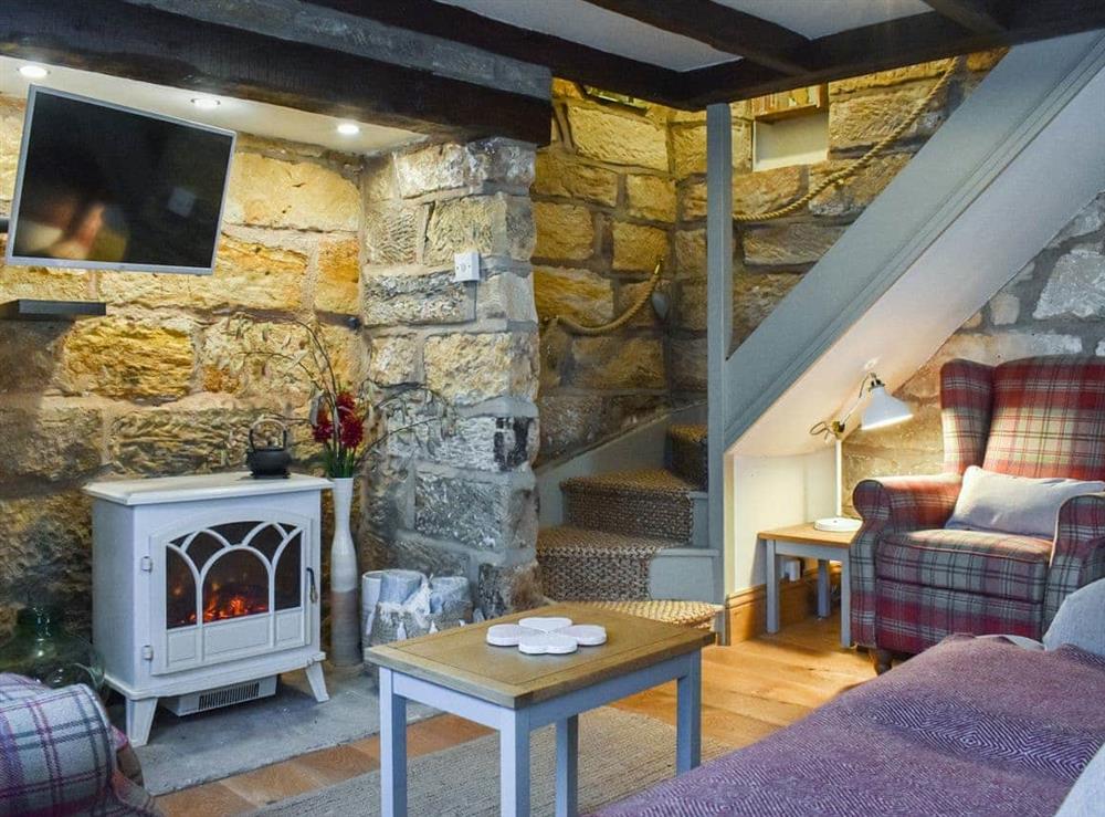 Living room at Fleur Cottage in Whitby, North Yorkshire