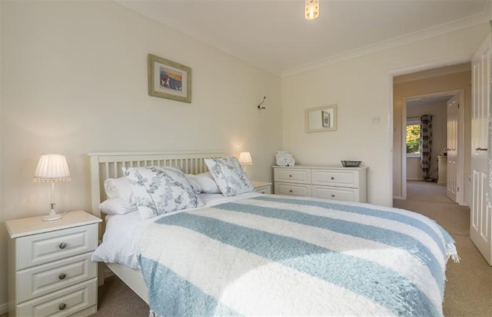 First floor:  Bedroom one with king size bed and views over castle ruins at Flint House, Castle Acre near Kings Lynn