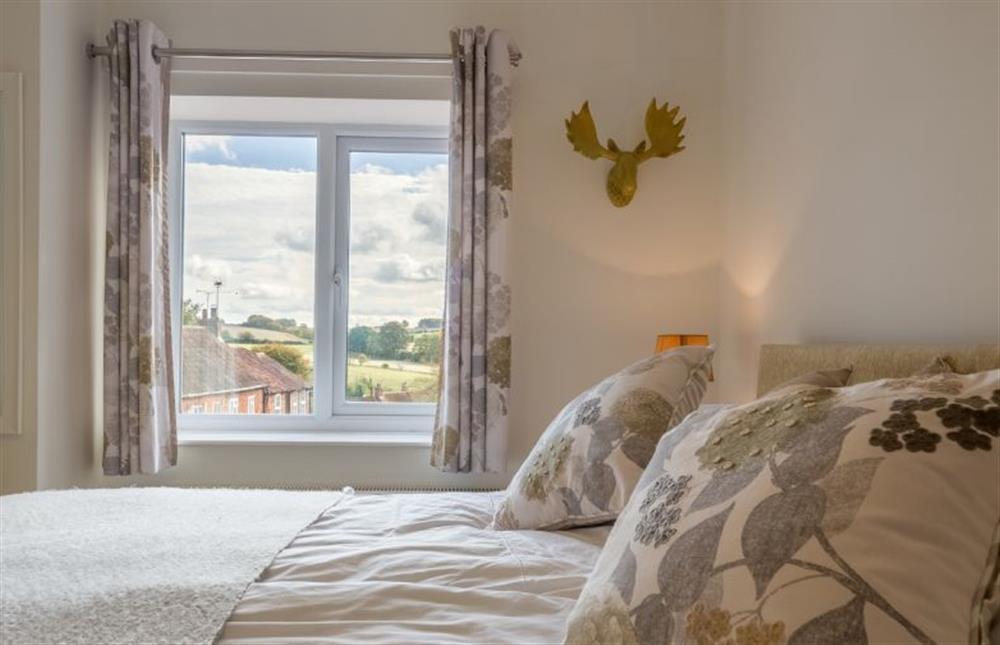 First floor:  Bedroom  three with twin single beds at Flint House, Castle Acre near Kings Lynn