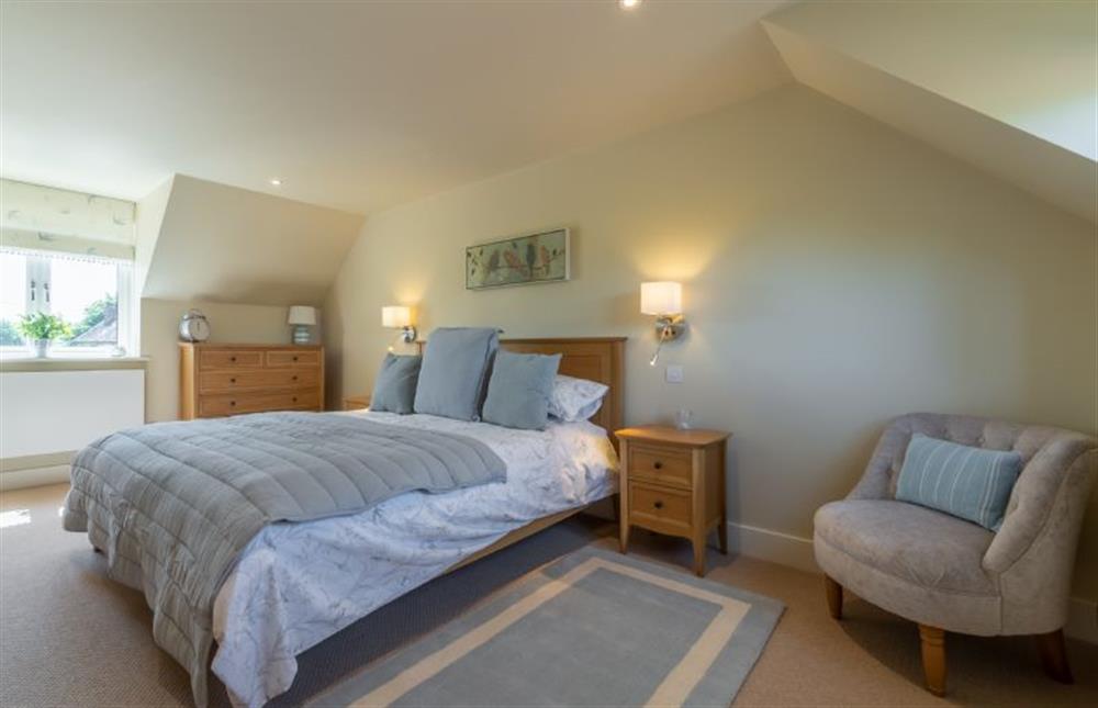 First floor: Dual aspect master bedroom at Flint House, Wighton near Wells-next-the-Sea