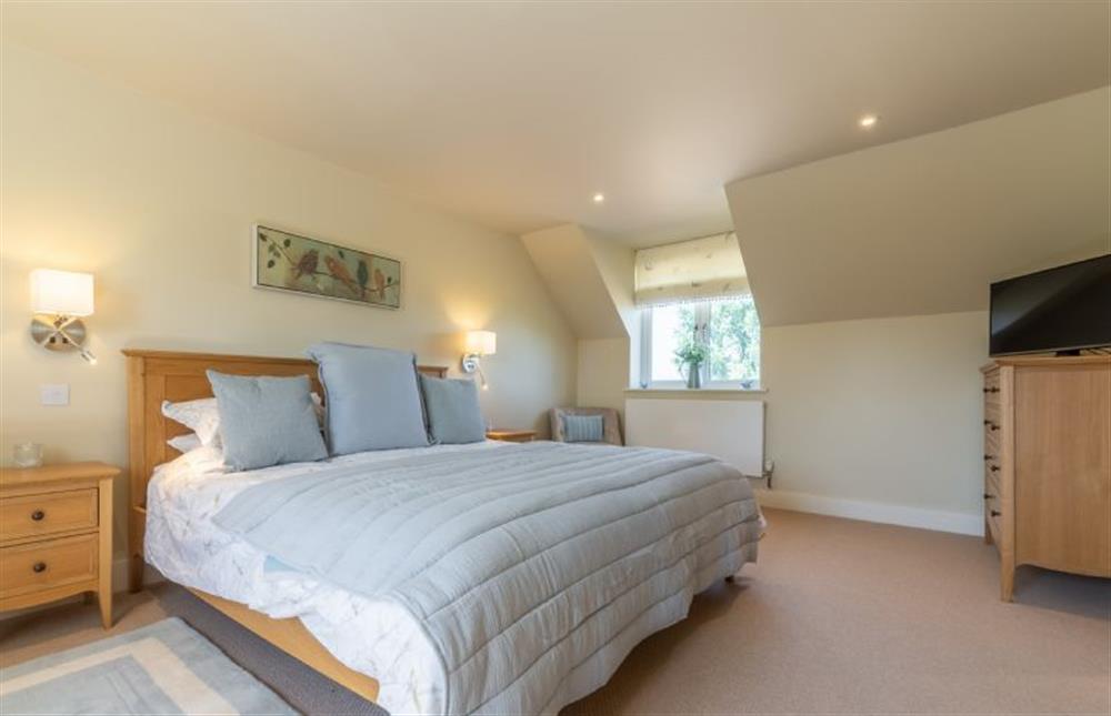 First floor: Master bedroom at Flint House, Wighton near Wells-next-the-Sea