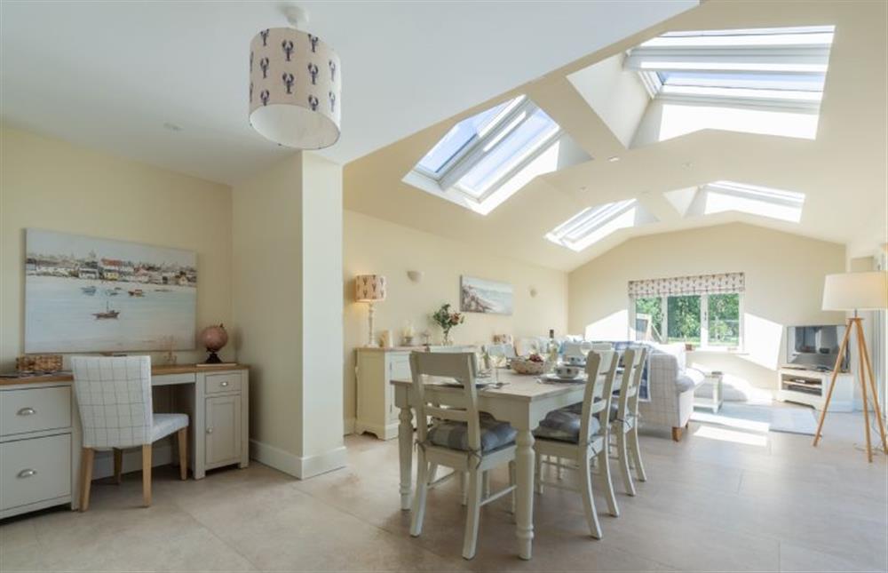 Ground floor: Dining area with desk at Flint House, Wighton near Wells-next-the-Sea