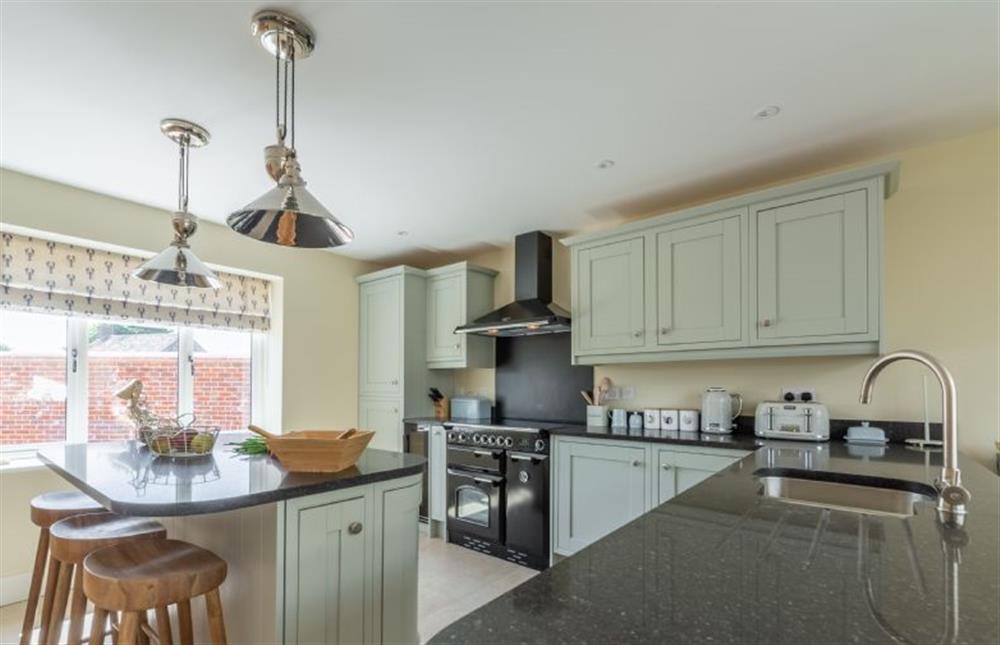 Ground floor: Kitchen area with seating at Flint House, Wighton near Wells-next-the-Sea