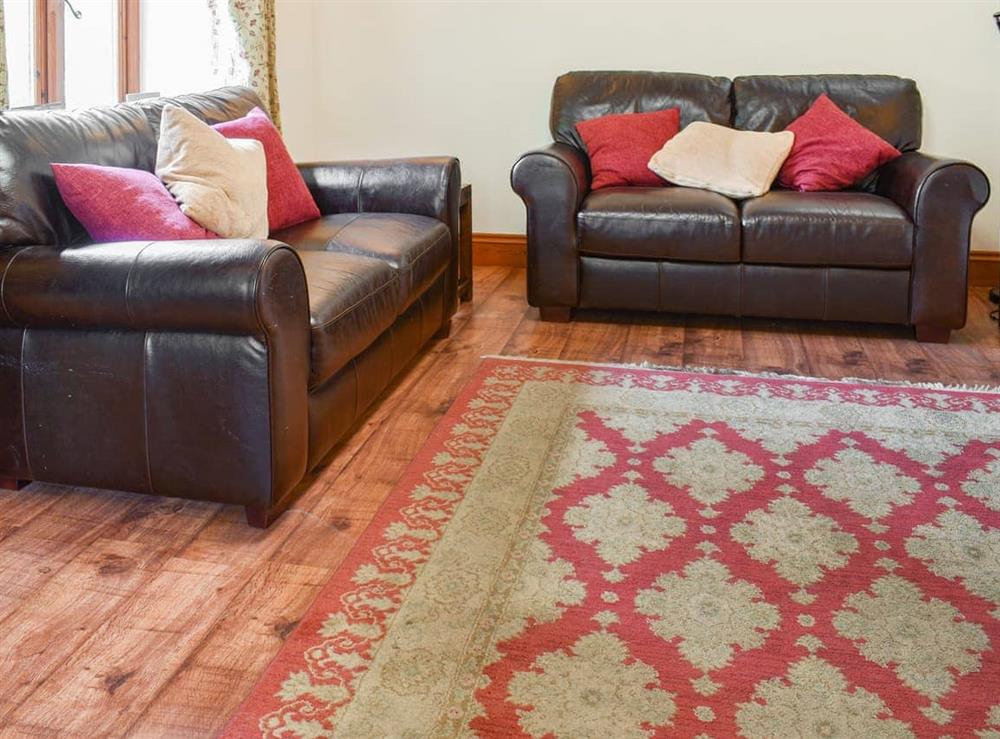 Living room at Flint Lodge in Plumstead Green, near Holt, Norfolk