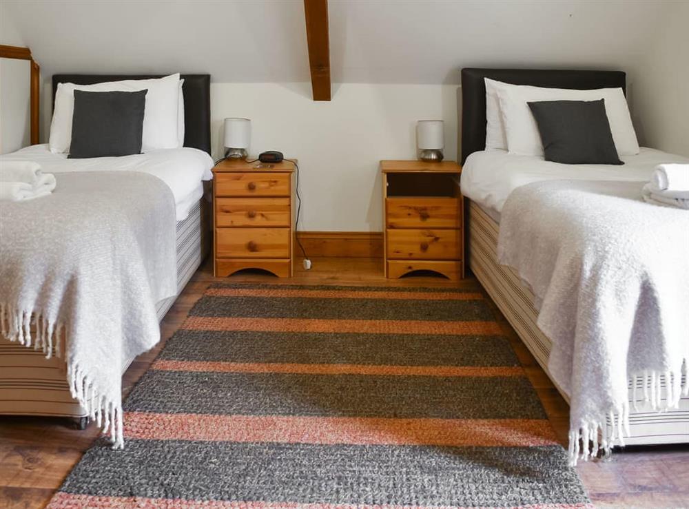 Twin bedroom at Flint Lodge in Plumstead Green, near Holt, Norfolk