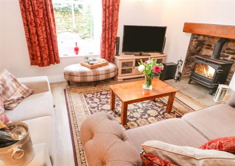 Relax in the living area at Flints Cottage, Richmond
