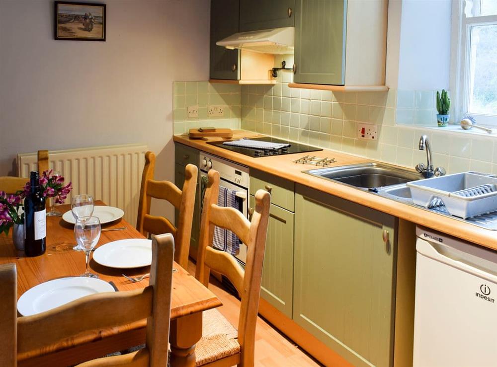 Kitchen and dining area (photo 2) at Flither Cottage in Staithes, near Saltburn-by-the-Sea, North Yorkshire