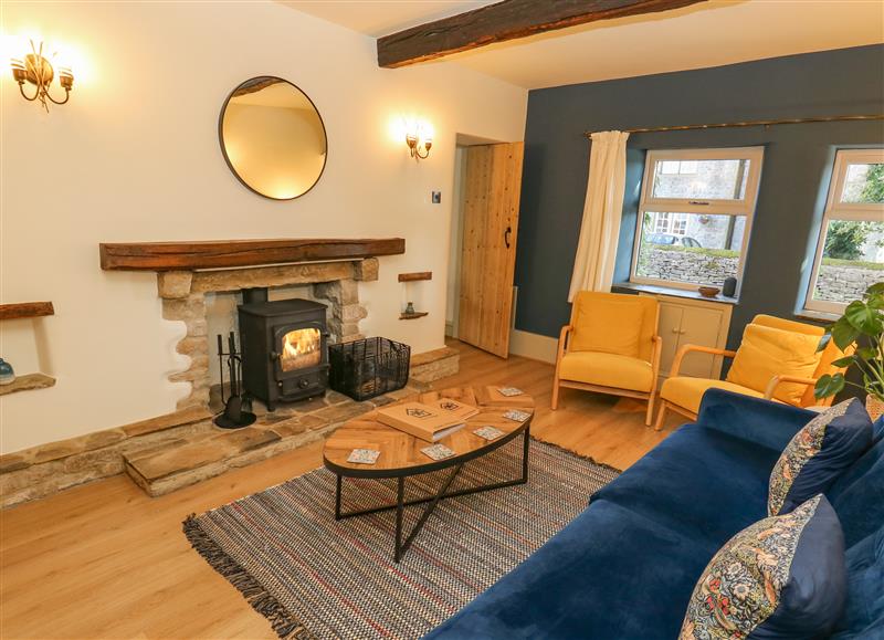 Relax in the living area at Flora Cottage, Tideswell