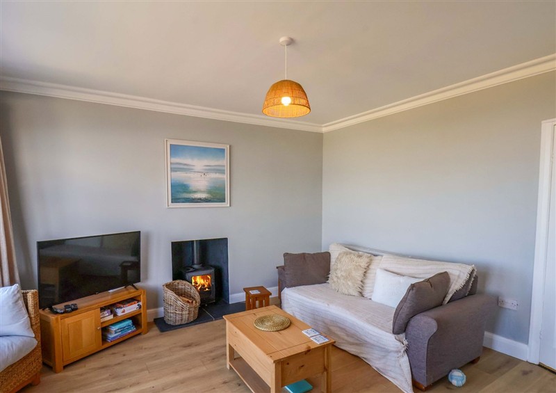 Enjoy the living room at Floraville, Cayton Bay