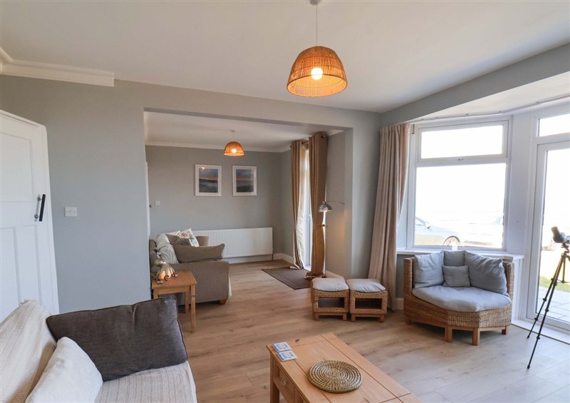 Relax in the living area at Floraville, Cayton Bay