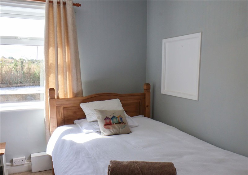 This is a bedroom (photo 2) at Floraville, Cayton Bay